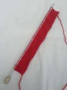 free knitted poppy pattern progress after first stage of casting on and knitting 8 rows