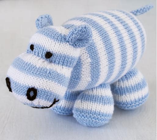 image of blue and white striped knitted toy from  easy striped hippo knitting pattern 